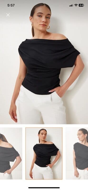 Zərif qara rəngli, çiyinləri açıq qadın topu. Bu, həm gündəlik, həm də lalafo.az -da Zərif qara rəngli, çiyinləri açıq qadın topu. Bu, həm gündəlik, həm də