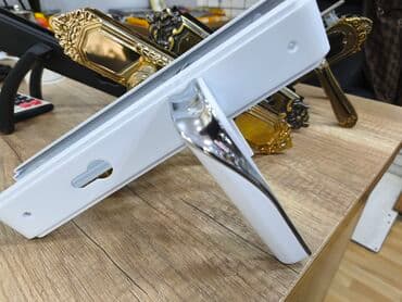 Qapı naliçnikləri: Ağ rəngli qapı tutacağı və uzun üzlük dəsti - Material: metal korpus lalafo.az -da — 1 Qapı naliçnikləri: Ağ rəngli qapı tutacağı və uzun üzlük dəsti - Material: metal korpus — 1