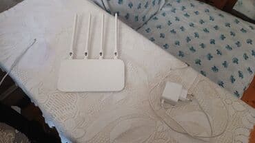 Wi‑Fi router – ağ rəngi, 4 ədəd tənzimlənən xarici antenalı model. Ev lalafo.az -da Wi‑Fi router – ağ rəngi, 4 ədəd tənzimlənən xarici antenalı model. Ev