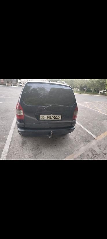 Opel Zafira A – 7 yerlik kompakt miniven - Kuzov: tünd mavi, dam lalafo.az -da Opel Zafira A – 7 yerlik kompakt miniven - Kuzov: tünd mavi, dam