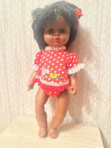 Damgali qedim alman zenci kuklasi, dogma paltarinda. Qolunda 2 yerde lalafo.az -da Damgali qedim alman zenci kuklasi, dogma paltarinda. Qolunda 2 yerde