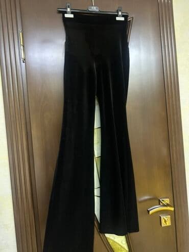 Qara rəngli, hündür belli, geniş balaqlı (flare) şalvar. - Material lalafo.az -da Qara rəngli, hündür belli, geniş balaqlı (flare) şalvar. - Material