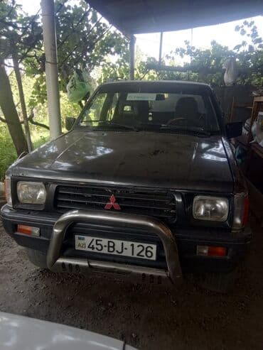 Mitsubishi L200 (pickup) - Kuzov: dördqapılı pikap, üzərində sərt lalafo.az -da Mitsubishi L200 (pickup) - Kuzov: dördqapılı pikap, üzərində sərt