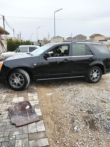 Cadillac SRX,il 2004, mator4,6 qara rəngli, 5 qapılı krossover/SUV lalafo.az -da — 1 Cadillac SRX,il 2004, mator4,6 qara rəngli, 5 qapılı krossover/SUV — 1