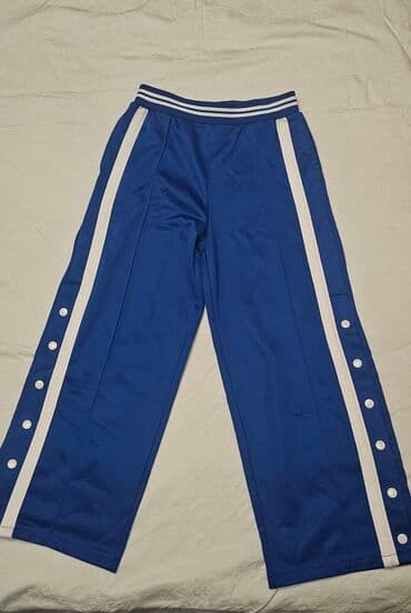 Mavi rəngli idman şalvarı 9 yas - Model: yanları düyməli “tear-away” lalafo.az -da Mavi rəngli idman şalvarı 9 yas - Model: yanları düyməli “tear-away”