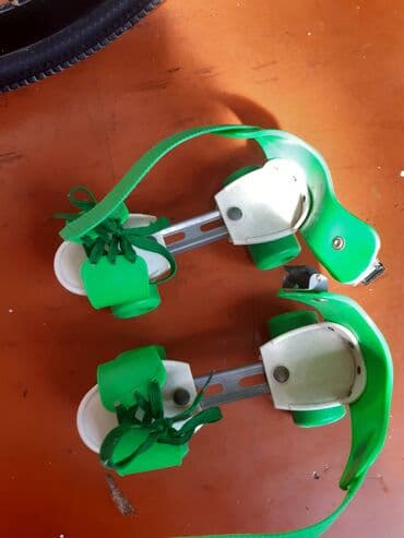 Yaşıl rəngdə, tənzimlənən qayışları olan bir cüt uşaq rolik konkisi lalafo.az -da Yaşıl rəngdə, tənzimlənən qayışları olan bir cüt uşaq rolik konkisi