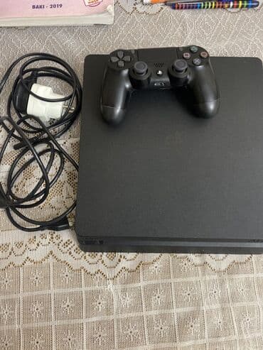 PlayStation 4 oyun konsolu Komplekt: - PS4 Slim konsol (qara) - 1 lalafo.az -da PlayStation 4 oyun konsolu Komplekt: - PS4 Slim konsol (qara) - 1