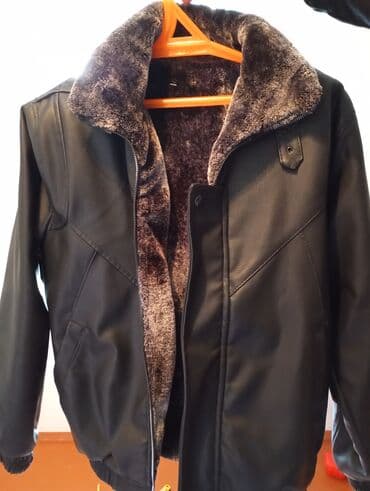 Qışlıq kişi kürkü ilə dəri gödəkçə - Rəng: qara (xarici hissə), tünd lalafo.az -da Qışlıq kişi kürkü ilə dəri gödəkçə - Rəng: qara (xarici hissə), tünd