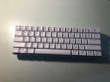 Kompakt mexaniki klaviatura – 60% Brown switch’ler ile ag rengde lalafo.az -da Kompakt mexaniki klaviatura – 60% Brown switch’ler ile ag rengde