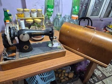 Mexaniki tikiş maşını – əl çarxlı, ağ-qara klassik model - Korpus lalafo.az -da Mexaniki tikiş maşını – əl çarxlı, ağ-qara klassik model - Korpus