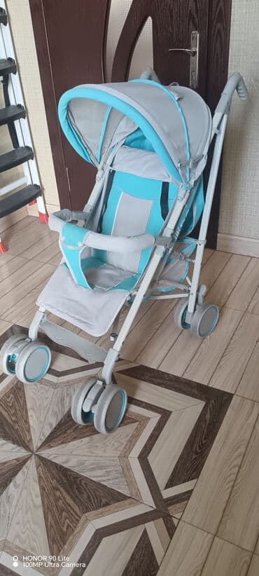 Boz və mavi rənglərdə olan bu uşaq arabası, günəşlik və oturacaq lalafo.az -da Boz və mavi rənglərdə olan bu uşaq arabası, günəşlik və oturacaq