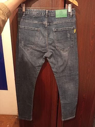 Uniseks mavi denim cins şalvar - Kəsim: dar/skinny siluet, qıçlara lalafo.az -da Uniseks mavi denim cins şalvar - Kəsim: dar/skinny siluet, qıçlara