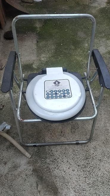 Tualet kreslosu (komod kreslo) - Daşına bilən, çərçivəsi metal at lalafo.az Tualet kreslosu (komod kreslo) - Daşına bilən, çərçivəsi metal