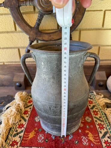 Bir vaza, Metal lalafo.az -da Bir vaza, Metal