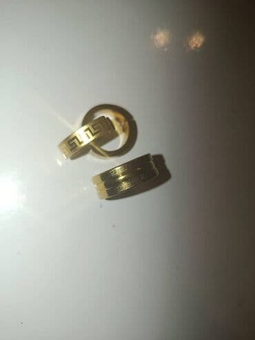 Qızılı rəngdə iki ədəd üzüklər dəsti. - Material: metal qızılı rəng lalafo.az -da Qızılı rəngdə iki ədəd üzüklər dəsti. - Material: metal qızılı rəng