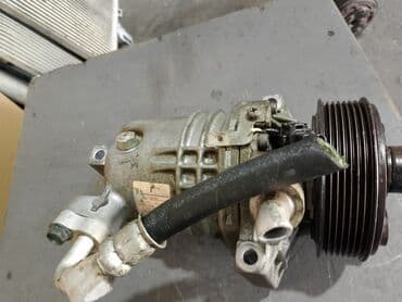 Kompressorlar: Avtomobil kondisionerinin kompressoru. Bu kompressor avtomobilinizdə lalafo.az -da — 3 Kompressorlar: Avtomobil kondisionerinin kompressoru. Bu kompressor avtomobilinizdə — 3