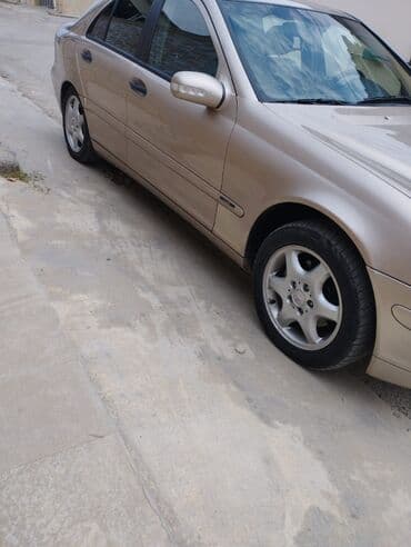 Mercedes-Benz C200 Kompressor sedan - Kuzov: bej rəng, 4 qapı, arxa lalafo.az -da Mercedes-Benz C200 Kompressor sedan - Kuzov: bej rəng, 4 qapı, arxa