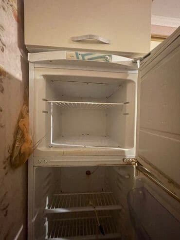 İşlənmiş 2 qapılı Indesit Soyuducu Satılır, rəng - Ağ, Təkərli lalafo.az -da İşlənmiş 2 qapılı Indesit Soyuducu Satılır, rəng - Ağ, Təkərli