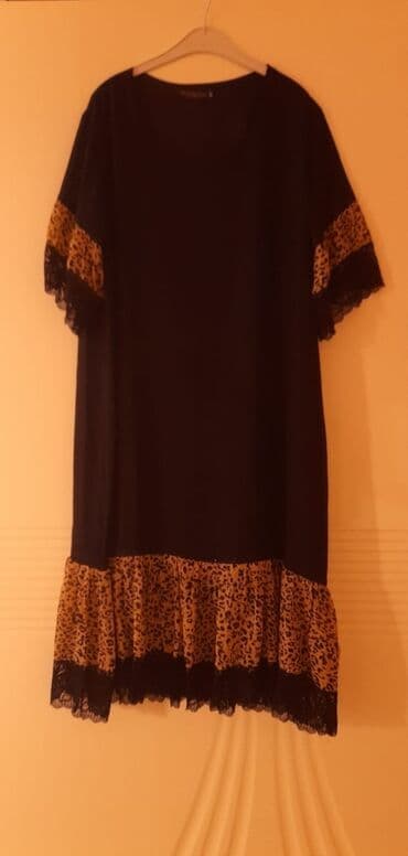 Qısaqol qara rəngli don, qol hissələrində və ətəyində tiqrovı parça lalafo.az -da Qısaqol qara rəngli don, qol hissələrində və ətəyində tiqrovı parça