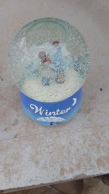 Qar kürəsi – “Winter” dizaynlı dekor - Şüşə kürə içində qız və oğlan lalafo.az -da Qar kürəsi – “Winter” dizaynlı dekor - Şüşə kürə içində qız və oğlan