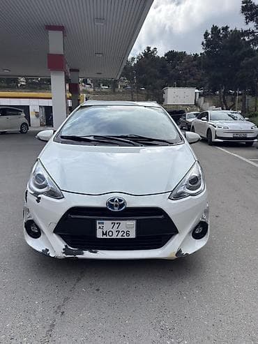 Toyota Aqua hibrid hetçbek - Rəng: ağ - Kuzov: 5 qapılı hetçbek - lalafo.az -da Toyota Aqua hibrid hetçbek - Rəng: ağ - Kuzov: 5 qapılı hetçbek -
