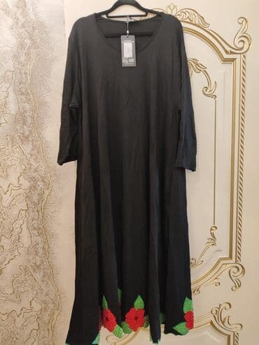 Qara rəngli uzun paltar - Model: geniş kəsimli, rahat siluetli uzun lalafo.az -da Qara rəngli uzun paltar - Model: geniş kəsimli, rahat siluetli uzun