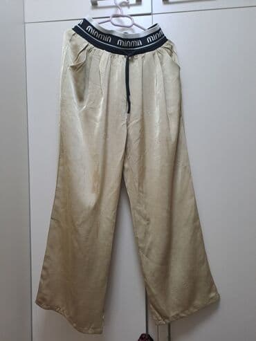 Qadın şalvarı – geniş kəsim, yüngül və parlaq fakturalı kumaş. Rəng lalafo.az -da Qadın şalvarı – geniş kəsim, yüngül və parlaq fakturalı kumaş. Rəng