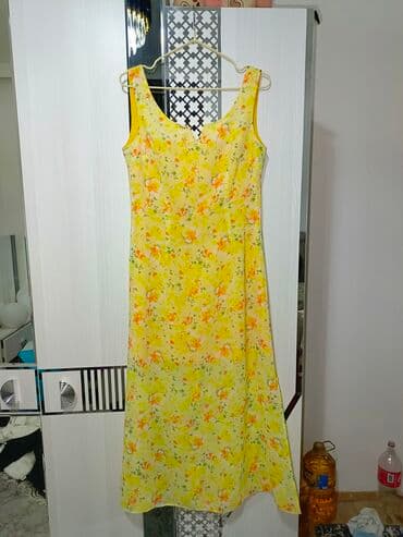 Sarı tonlarda çiçək naxışlı yay paltarı - Model: uzun, A-kəsim siluet lalafo.az -da Sarı tonlarda çiçək naxışlı yay paltarı - Model: uzun, A-kəsim siluet