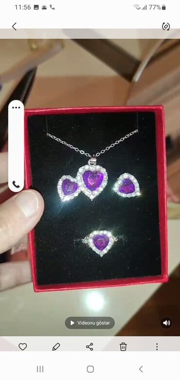 Bənövşəyi ürək formalı qaşlarla bəzədilmiş zərgərlik dəsti. Dəst lalafo.az -da Bənövşəyi ürək formalı qaşlarla bəzədilmiş zərgərlik dəsti. Dəst