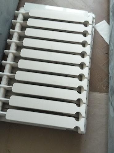 Radiator islenmis. 34 seksiyadi tam isley lalafo.az -da Radiator islenmis. 34 seksiyadi tam isley