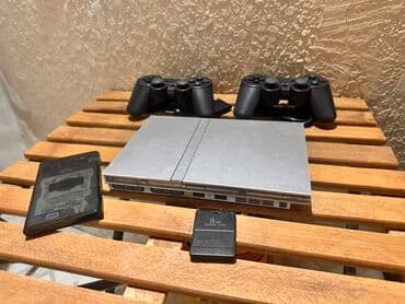 Playstation 2 Slim Silver (gümüşü rəng)+ 200 oyun. Bölgələrə pulsuz lalafo.az -da Playstation 2 Slim Silver (gümüşü rəng)+ 200 oyun. Bölgələrə pulsuz