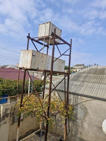 Su çəni sistemi və metal dayaq konstruksiyası Üç mərtəbəli metal lalafo.az -da Su çəni sistemi və metal dayaq konstruksiyası Üç mərtəbəli metal