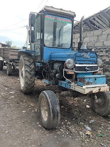 Mavi rəngli traktor, arxa qoşqu çəkmək üçün hazır qurğulu. Kabinli lalafo.az -da — 8 Mavi rəngli traktor, arxa qoşqu çəkmək üçün hazır qurğulu. Kabinli — 8