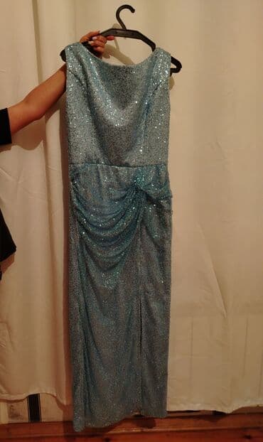 Mavi rəngli, parıltılı qadın gecə/libas paltarı.Cemi 1 dəfə lalafo.az -da Mavi rəngli, parıltılı qadın gecə/libas paltarı.Cemi 1 dəfə