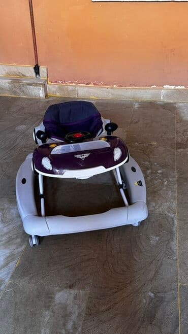 Uşaq gəzdirən (walker) – avtomobil dizaynlı, bənövşəyi/ağ rəngdə lalafo.az -da Uşaq gəzdirən (walker) – avtomobil dizaynlı, bənövşəyi/ağ rəngdə