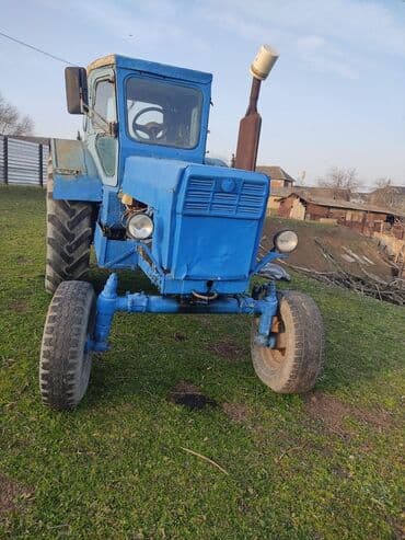 Mavi rəngli təkərli kənd təsərrüfatı traktoru - Korpus: kabinalı, üç lalafo.az -da Mavi rəngli təkərli kənd təsərrüfatı traktoru - Korpus: kabinalı, üç