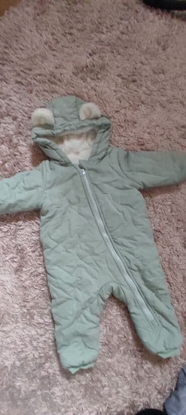 Tulum kurtka 12-18ay usaq ucun yeni kimidir az istifade olunub ciddi lalafo.az -da Tulum kurtka 12-18ay usaq ucun yeni kimidir az istifade olunub ciddi