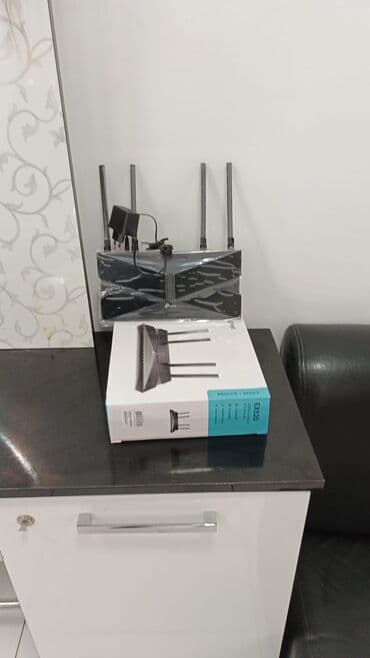 TP-Link Aginet EX520 – AX3000 Dual modem ünvan Elemler lalafo.az -da TP-Link Aginet EX520 – AX3000 Dual modem ünvan Elemler