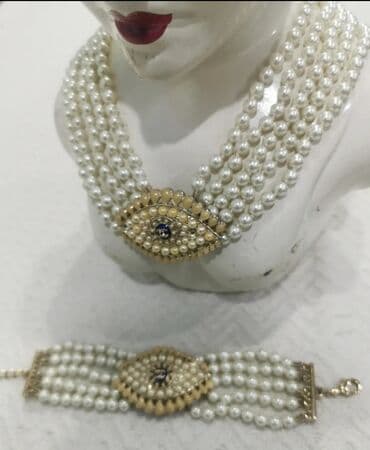 İnci dəsti – kollye və bilərzik - Dizayn: “Göz” motivli mərkəzi lalafo.az -da İnci dəsti – kollye və bilərzik - Dizayn: “Göz” motivli mərkəzi