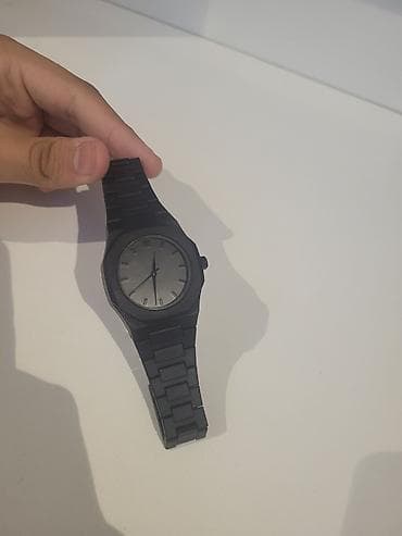 Minimalist analoq əl saatı – tam qara dizayn. - Korpus: mat qara lalafo.az -da Minimalist analoq əl saatı – tam qara dizayn. - Korpus: mat qara