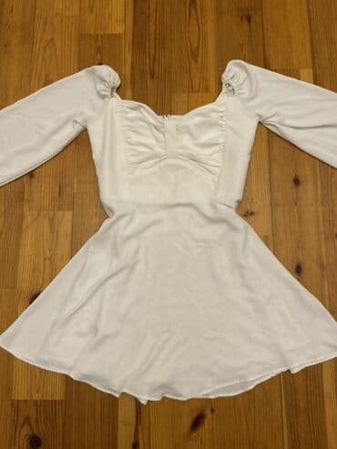 Ağ rəngli qadın paltarı - Dizayn: şirin ürəkvari dekolteli, yüngül lalafo.az -da Ağ rəngli qadın paltarı - Dizayn: şirin ürəkvari dekolteli, yüngül