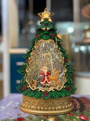 Yeni il dekoru – LED işıqlı musiqili qar kürəsi - Forma: şam ağacı lalafo.az -da Yeni il dekoru – LED işıqlı musiqili qar kürəsi - Forma: şam ağacı