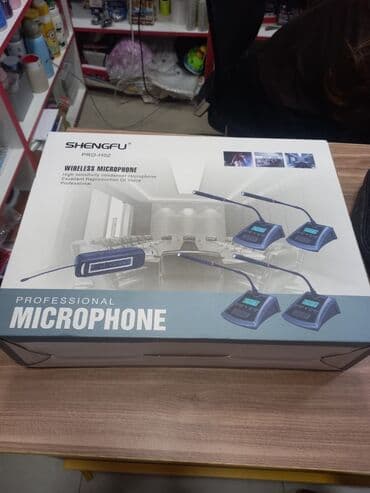 Mikrafon desti icinde 4 eded basilib danisilan mikrafon var tezedi lalafo.az -da Mikrafon desti icinde 4 eded basilib danisilan mikrafon var tezedi