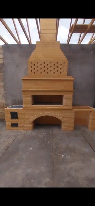 Manqal.oda davamli kərpiclə yiqilmis lalafo.az -da Manqal.oda davamli kərpiclə yiqilmis