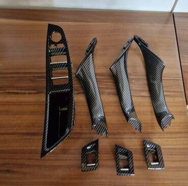 BMW f10 üçün karbon lif və digər rənglərdə salon qapı qolu dəstləri lalafo.az -da BMW f10 üçün karbon lif və digər rənglərdə salon qapı qolu dəstləri