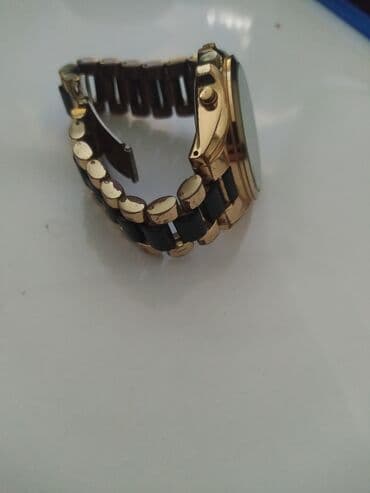 Qızılı-qara klassik qol saatı - Korpus: metal, qızılı rəng - lalafo.az -da Qızılı-qara klassik qol saatı - Korpus: metal, qızılı rəng -