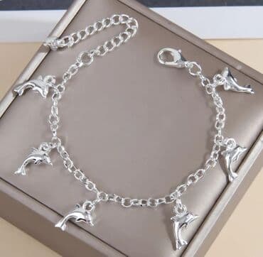 Delfin bəzəkli zəncir qolbaq - Material: gümüş rəngli metal ərinti - lalafo.az -da Delfin bəzəkli zəncir qolbaq - Material: gümüş rəngli metal ərinti -