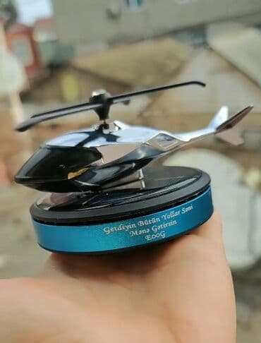 Maşın aksesuarı günəş şüaları altında fırlanır istənilən yazı yazılır lalafo.az -da Maşın aksesuarı günəş şüaları altında fırlanır istənilən yazı yazılır