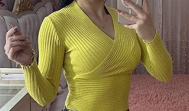Qadın sviteri – sarı/limon rəngi, uzunqol, bədənəoturan model. - lalafo.az -da Qadın sviteri – sarı/limon rəngi, uzunqol, bədənəoturan model. -
