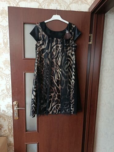 Qadın paltarı – leopard naxışlı, A-kəsim - Üst qat: şəffaf tül lalafo.az -da Qadın paltarı – leopard naxışlı, A-kəsim - Üst qat: şəffaf tül